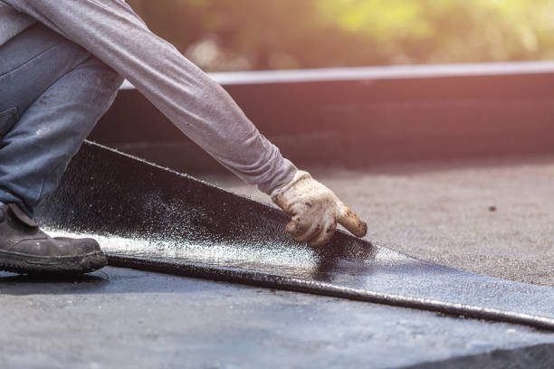 Professional Basement Waterproofing technician working in Glyndon, MD